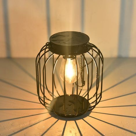 Metal solar lantern, waterproof, automatic switch, decorative outdoor light, perfect for gardens and patios. (1/5)