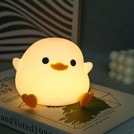 Bonita luz nocturna LED para niños con diseño de pato，lámpara de mesita de noche，fabricada en silicona，regulable y con temporizador (1/5)
