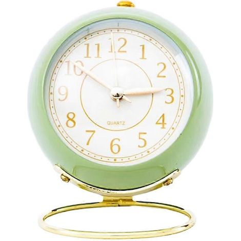 Cette horloge de bureau rétro, rétroéclairée, mignonne et minimaliste, est dotée d'une veilleuse, est silencieuse (sans tic-tac), fonctionne sur piles et est écologique. (1/5)