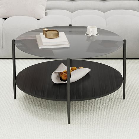 Una mesa de centro minimalista y moderna para el salón, compuesta por una tapa redonda de cristal negro y una base de madera negra, a la vez estética y práctica. (1/5)