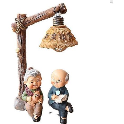 Veilleuse, lampe, grand-père, grand-mère lisent des livres sous la lumière, décorations en résine
