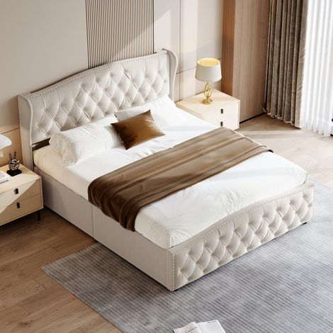 Lit capitonné 140x190 cm en velours blanc cassé, rivets décoratifs, design vague (1/5)
