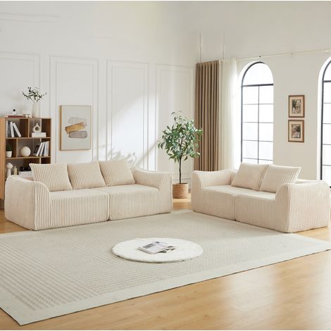 Sofá modular de pana y espuma beige, diseño curvo, asientos amplios, sin montaje (1/5)