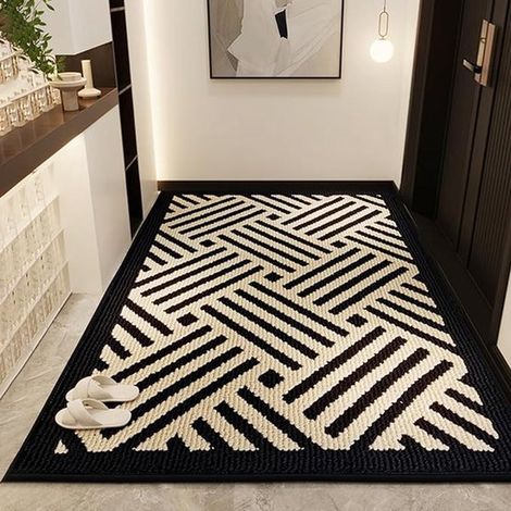 Felpudo antideslizante con propiedades absorbentes para uso interior y exterior. (1/5)
