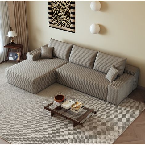 Divano angolare modulare da 270 cm con chaise longue reversibile, non richiede montaggio, tessuto in velluto a coste color cammello per soggiorno. (1/5)