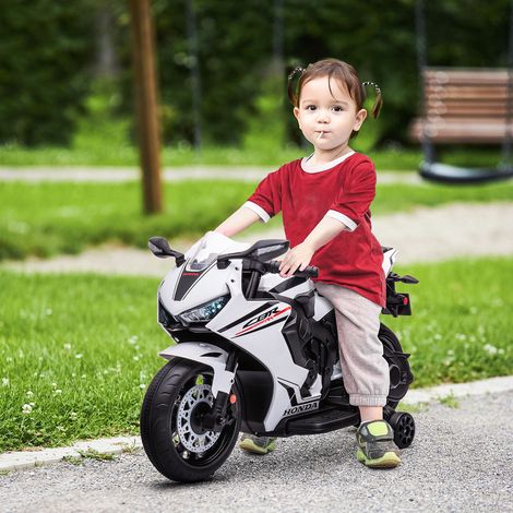 Moto Électrique Licence Honda Phares Klaxon Musique Jantes Auxiliaires Blanches Article Enfant 3 à 5 ans 90x44x52cm