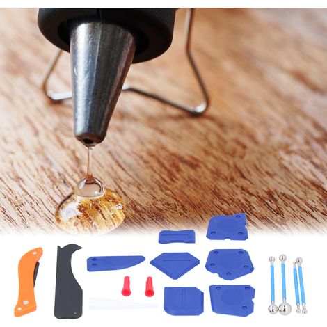 Ensemble de 16 pièces comprenant un couteau à jointoyer pour carrelage de sol, un grattoir pour mastic de colle à verre, une boule d'acier pour presser le joint et une buse à joint. (1/5)