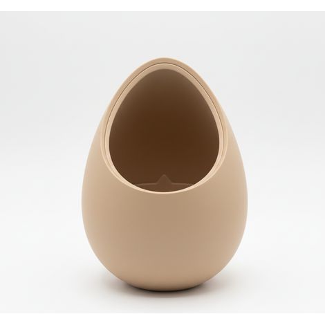 Un moderno vaso decorativo beige a forma di nido di piante. (1/3)