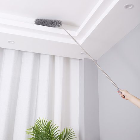 Plumero de microfibra con mango telescópico largo y cabezal flexible para limpiar telarañas del techo. (1/5)