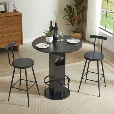 Conjunto de mesa y taburetes de bar de 3 piezas con mesa redonda de madera y dos taburetes con reposapiés anulares en metal, en negro (1/5)