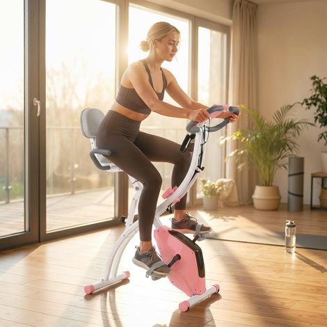 Vélo d’appartement pliable 2 en 1, résistance magnétique réglable 8 niveaux, home trainer silencieux avec cardiofréquencemètre, élastiques pour bras, écran LCD, volant 2,5 kg, rose (1/5)