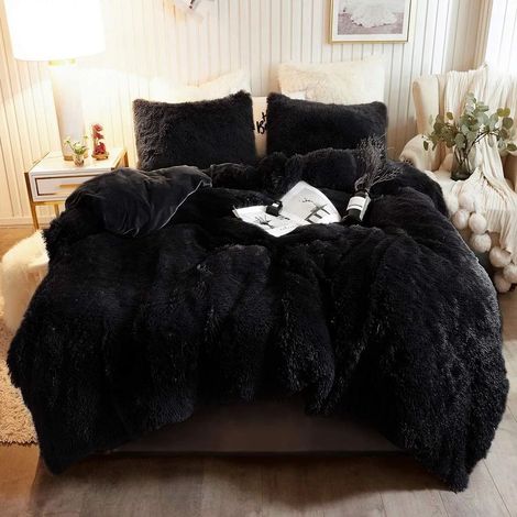 Ensemble 3 pièces comprenant une housse de couette en duvet de 220 x 240 cm et un coussin confortable en fausse fourrure noire. (1/5)