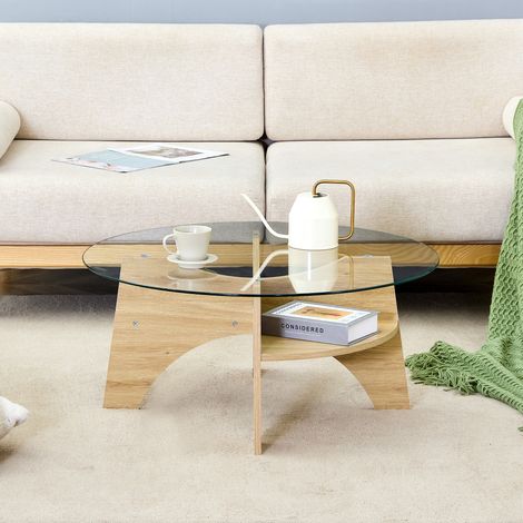 Table basse ronde verre Ø80 cm,cadre éventail,pieds MDF aspect bois naturel. Design léger et fonctionnel pour tout salon.