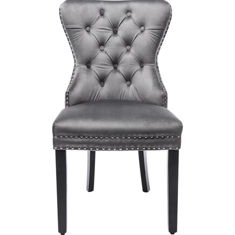 Set de 4 sillas de comedor de terciopelo gris con patas de madera y detalles capitoné (1/5)