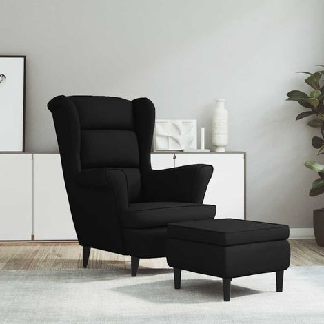 Fauteuil à oreilles avec tabouret noir velours (1/5)