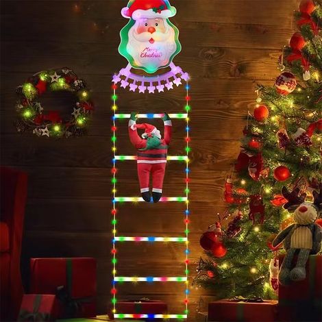 Lumière lumineuse décorative de Noël représentant le Père Noël grimpant à une échelle, à accrocher au mur, à un arbre, dans un jardin ou une cour. (1/5)