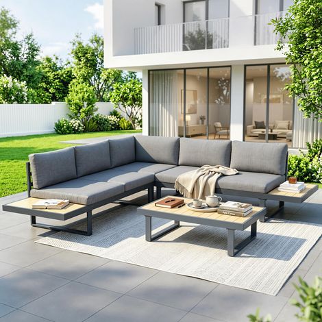 Salon d'angle design pour le jardin avec 5 places assises, coussins et table basse en aluminium gris anthracite et effet bois. (1/5)