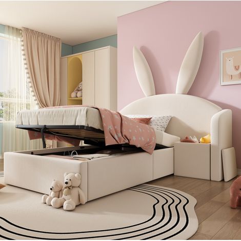 Cama infantil tapizada beige 90x190 cm de terciopelo con cabecero de orejas de conejo, arcón hidráulico y mesita