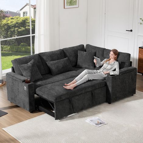 Ce canapé d'angle extensible en forme de L se transforme en méridienne et comprend un espace de rangement, des porte-gobelets, des ports de chargement USB, (1/5)