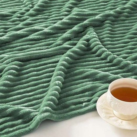 Coperta in morbida flanella 150x200 cm, calda e avvolgente, verde chiaro. (1/3)