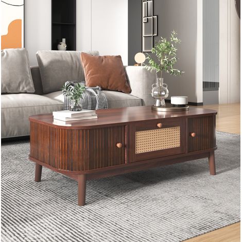 Table basse en MDF naturel effet noyer 110 cm avec détails en rotin et portes coulissantes (1/5)