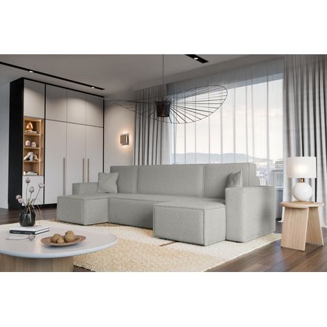 Divano letto angolare reversibile con vano contenitore universale Karl U in tessuto bouclé grigio chiaro del produttore - VINOTTI