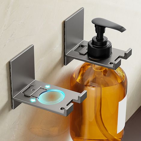 Support mural réglable auto-adhésif pour flacons de gel douche et de shampoing, idéal pour la salle de bain et la cuisine. (1/5)
