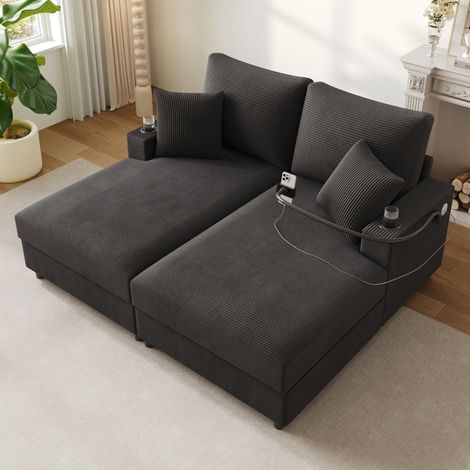 Canapé-lit 2 places avec dossier rembourré, porte-gobelet, support smartphone et port USB recharge. Idéal pour salon, chambre ou home cinéma. Couleur gris.