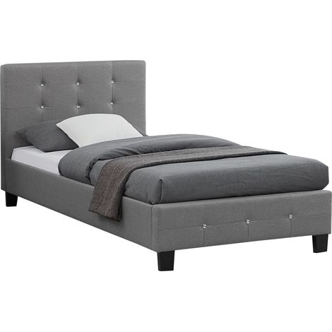 Idimex – Lit simple gris 90x190 cm – Structure capitonnée avec sommier à lattes inclus – 4 pieds robustes pour stabilité (1/4)