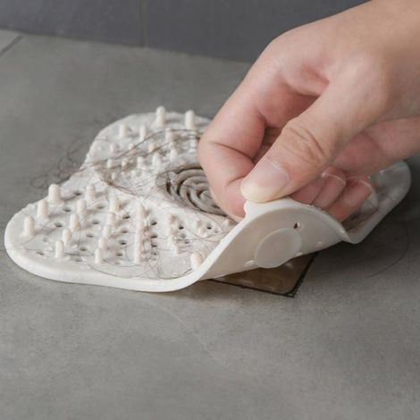 Rejilla de desagüe de silicona reutilizable con ventosas para ducha y baño. (1/5)