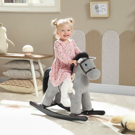 Cheval à bascule pour enfants. jouet à bascule bébé en peluche avec eouetffet sonore et poupée. 71 x 26 x 55 cm. gris