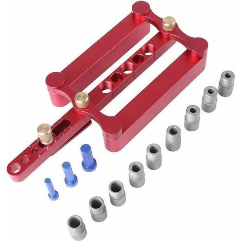 Outil trois-en-un pour poinçonner le bois verticalement : localisateur, ouvre-trous de tenon rouge et règle.