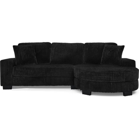 Sofá esquinero en L de 4 plazas, corduroy negro, puf ovalado móvil, 2 cojines (1/5)