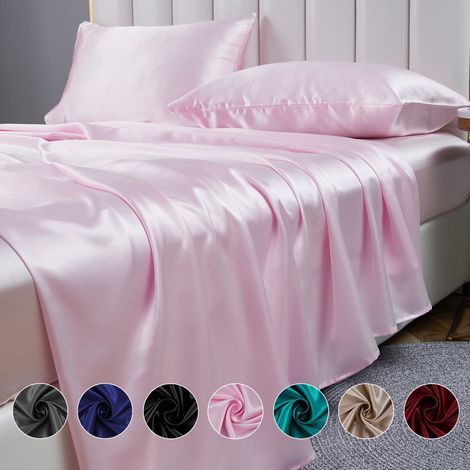 3-teiliges Bettwäscheset aus hellrosa Satin, bestehend aus einem Spannbettlaken und einem Seidenlaken. (1/5)