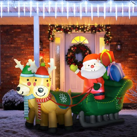 Décoration de Noël gonflable Père Noël avec traîneau et 2 rennes, illuminée par 4 LED (210 x 70 x 125 cm). (1/5)