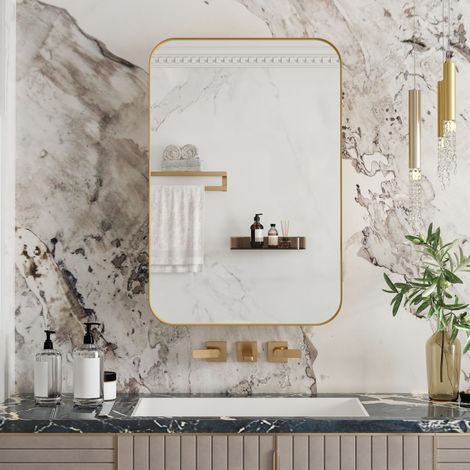 Une élégante armoire à pharmacie rectangulaire à miroir. Cette armoire murale à miroir, dotée d'une structure en métal, est spécialement conçue pour le rangement des médicaments.  Finition dorée. (1/5)