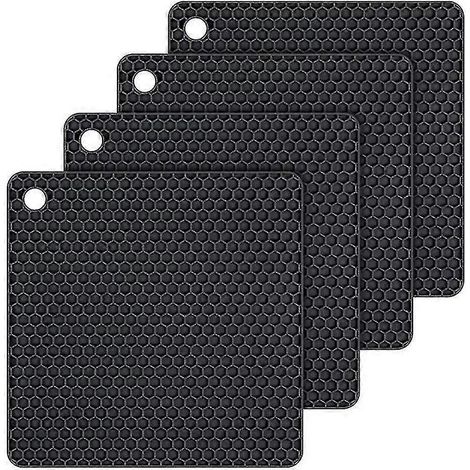 Set mit 4 schwarzen, quadratischen Silikonuntersetzern, hitzebeständig und spülmaschinenfest.