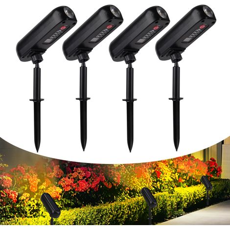 (Blanc chaud) Lot de 4 lampes solaires LED d'extérieur, appliques murales solaires IP65, éclairage vert pour jardin, projecteurs solaires, compatibles avec arbres, allées et cours. (1/5)