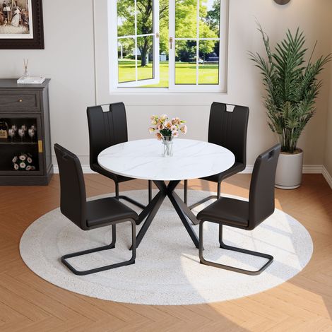 Set da pranzo moderno con tavolo rotondo in effetto marmo bianco, sedie nere in PU, MDF e metallo (1/5)