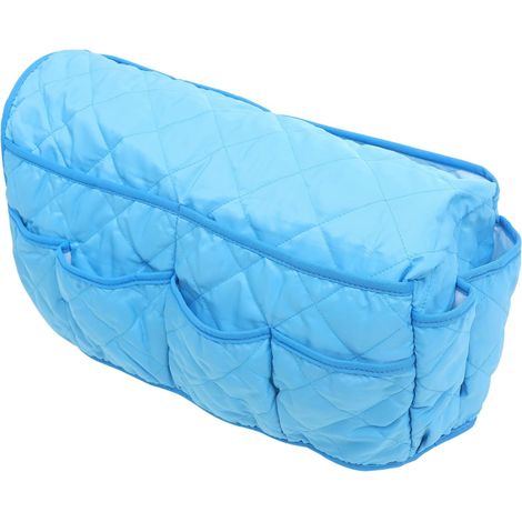 Bolsillo lateral plegable azul para el reposabrazos, ideal para guardar mandos a distancia y objetos pequeños. (1/5)