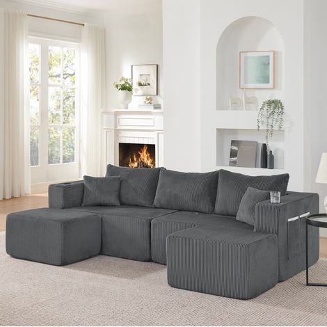 Sofá esquinero modular de 3 plazas en pana gris con pufs móviles