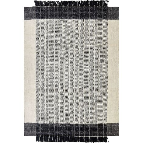 Tappeto moderno in lana con frange decorative 160 x 230 cm in bianco e nero Ketenli (1/5)