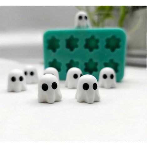Moule à chocolat d'Halloween 3D en silicone rose, motif crâne et personnages de films d'horreur, idéal pour la confection de chocolats et bonbons maison. Modèle BusStyle 7. (1/5)