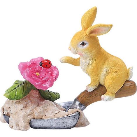 Statue de lapin de dessin animé à lumière solaire, animal mignon en résine assis avec pelle, lapin blanc