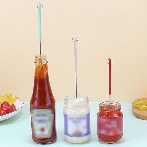 Lot de 2 mini spatules en silicone réutilisables et rétractables, fines et raclettes pour pots, idéales pour le maquillage, la beauté et la cuisine. (1/5)