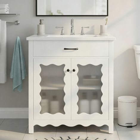 Tocador de baño de 30 pulgadas con vidrio templado, mueble moderno con patas de madera de caucho y puertas de cierre suave, blanco (1/5)
