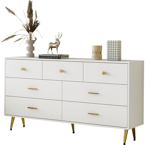 Meuble de cuisine blanc, 7 tiroirs, poignées en or, pieds en or également. Les tiroirs sont lisses. Dimensions : 1403576 cm. Meuble idéal pour le rangement des ustensiles de la cuisine. (1/4)