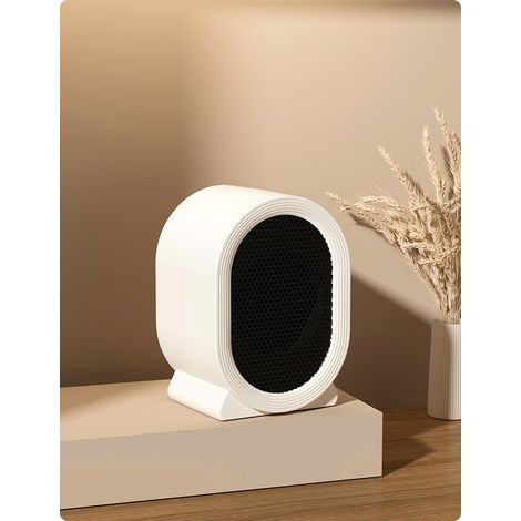 Chauffage soufflant portable en céramique, chauffage rapide, deux réglages de température et protection contre la surchauffe en cas de basculement. (1/5)
