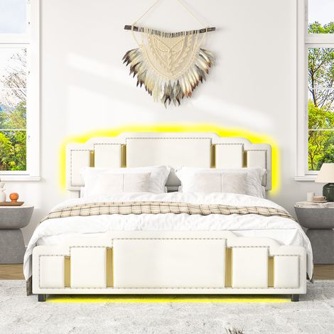 Letto contenitore in velluto beige 140x200 cm con meccanismo idraulico, illuminazione a LED integrata e testiera imbottita.