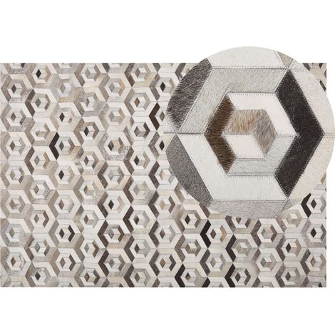 Alfombra de piel de vacuno beige y marrón rectangular 140 x 200 cm patchwork patrón geométrico retro Tavak (1/5)